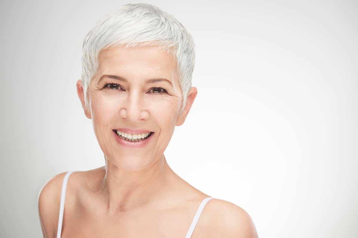 Woman receiving a Radiesse injectable treatment