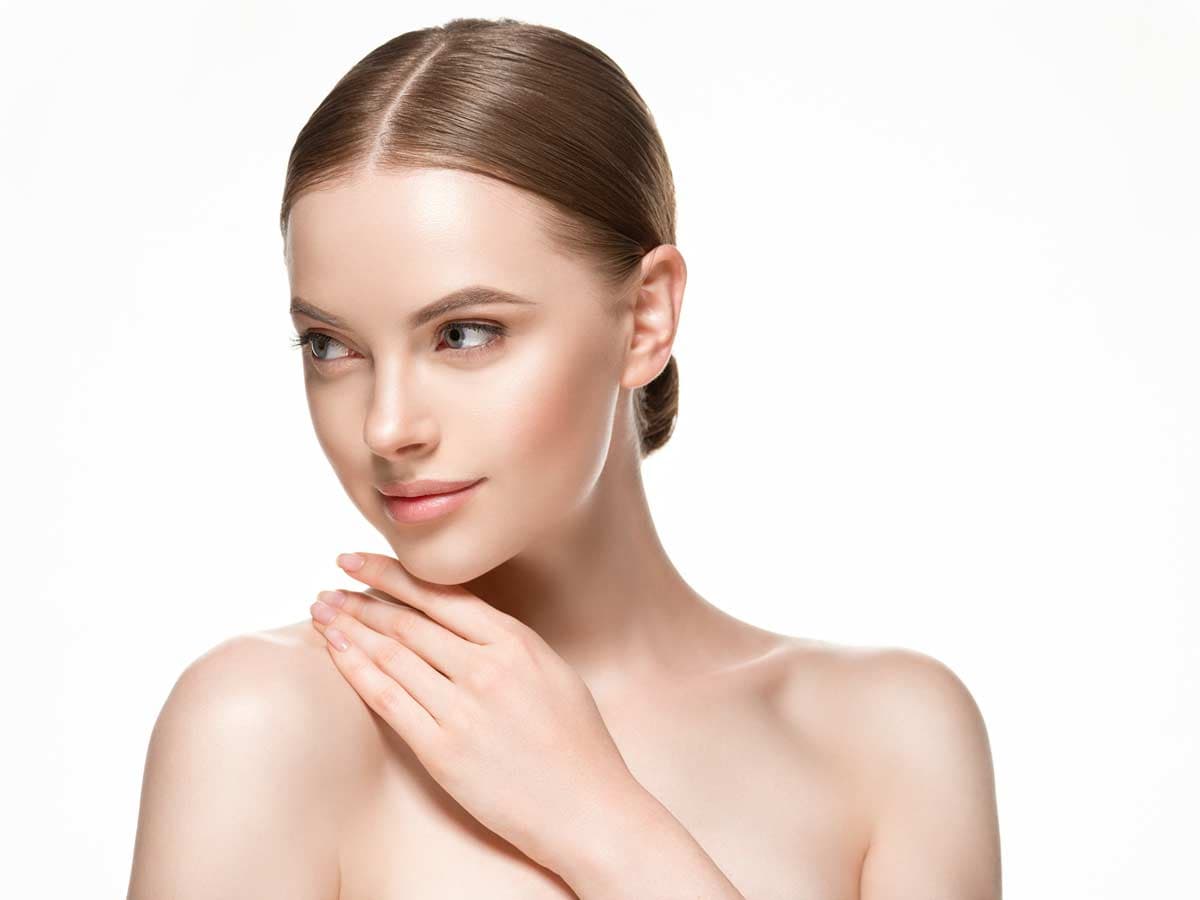 Woman with restored facial volume after Sculptra treatment